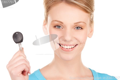 Image of happy woman with car key