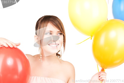 Image of happy teenage girl with balloons