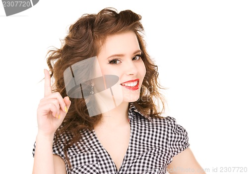 Image of teenage girl with her finger up