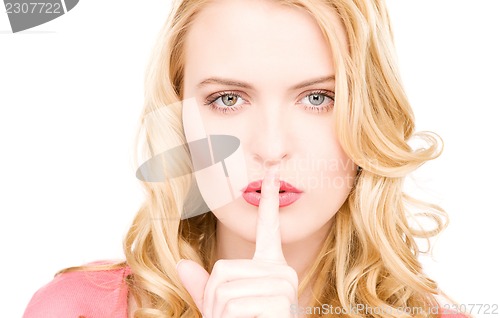 Image of finger on lips