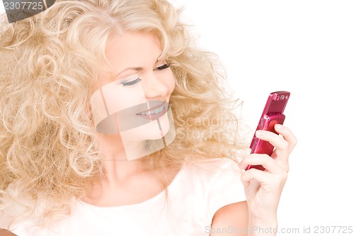 Image of happy woman with cell phone