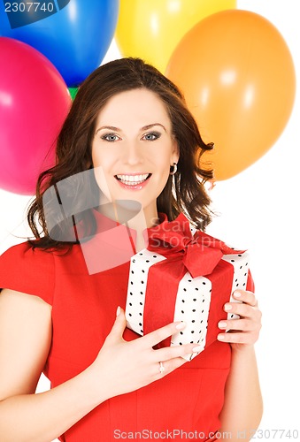 Image of woman with gift box and balloons