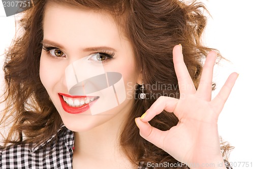 Image of woman showing ok sign