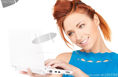 Image of happy woman with laptop computer