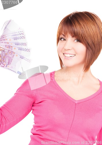 Image of happy woman with money