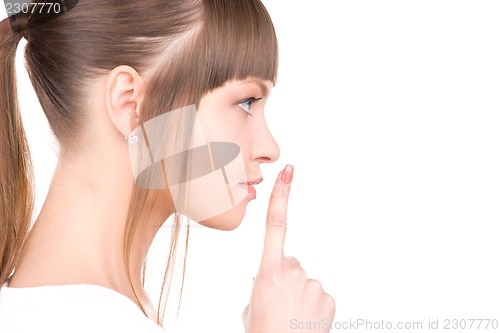 Image of finger on lips