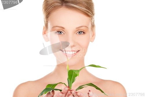 Image of woman with sprout