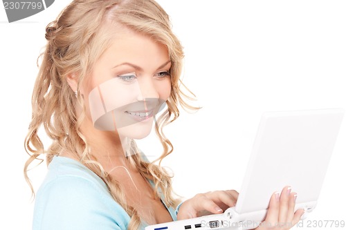 Image of happy woman with laptop computer