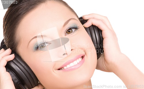 Image of happy woman in headphones