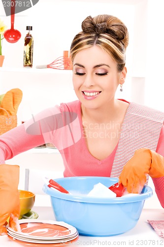 Image of housewife washing dish