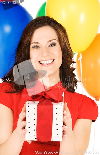 Image of happy woman with gift box