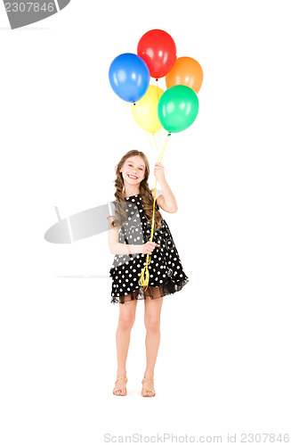 Image of happy girl with colorful balloons