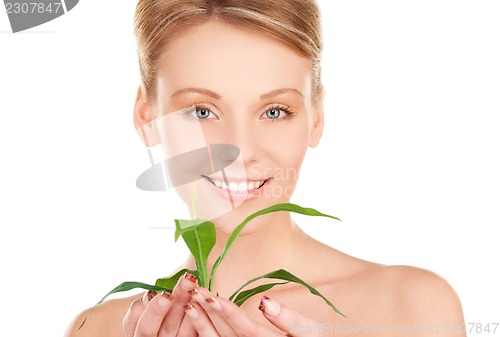 Image of woman with sprout