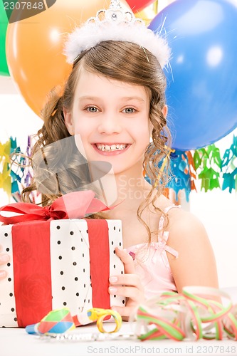 Image of party girl with balloons and gift box