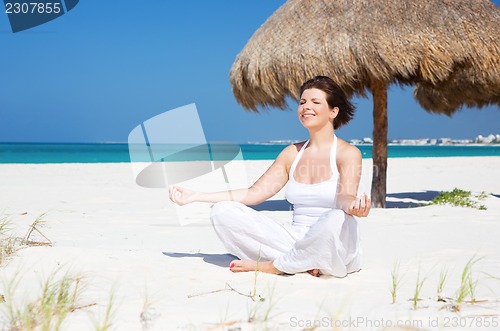 Image of meditation on the beach