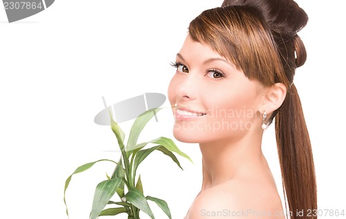 Image of woman with sprout