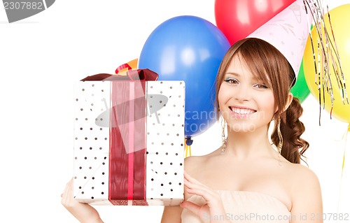 Image of party girl with balloons and gift box