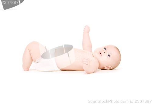 Image of laying baby boy in diaper