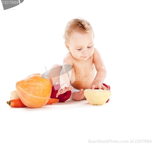 Image of baby boy with vegetables