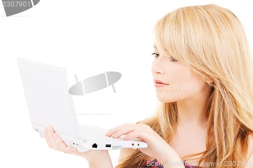 Image of teenage girl with laptop computer