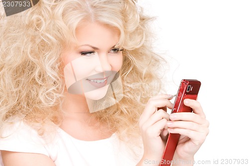 Image of happy woman with cell phone