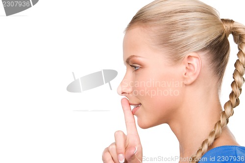 Image of finger on lips