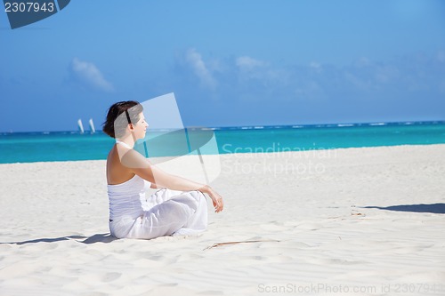 Image of meditation on the beach