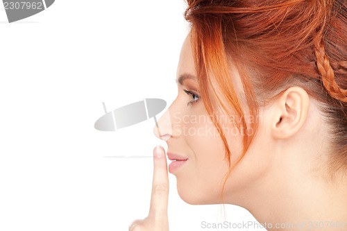 Image of finger on lips