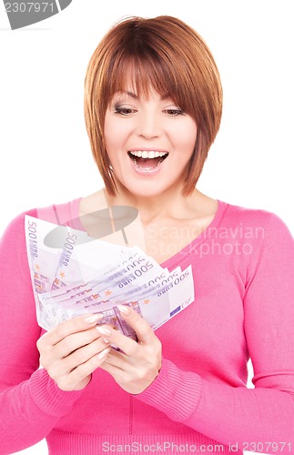 Image of happy woman with money