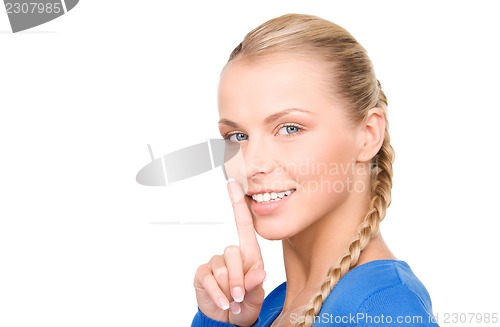 Image of finger on lips