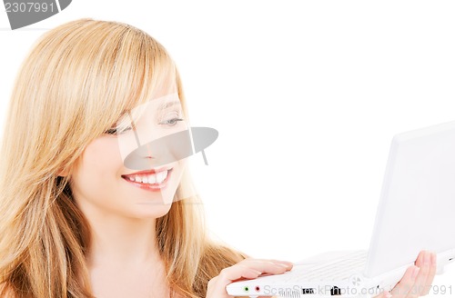 Image of teenage girl with laptop computer