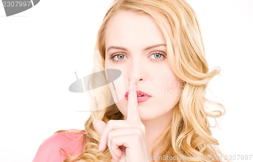 Image of finger on lips