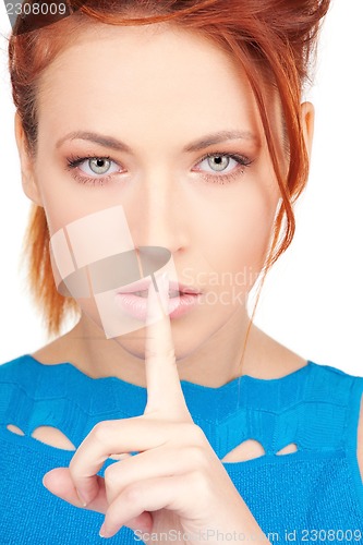 Image of finger on lips