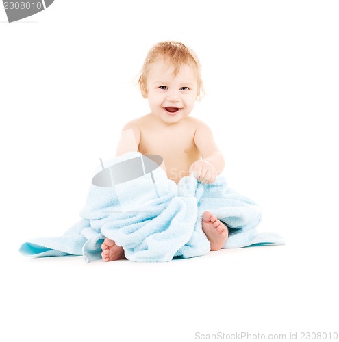 Image of baby with blue towel