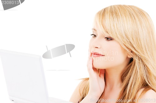 Image of teenage girl with laptop computer