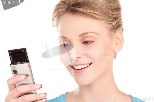 Image of happy woman with cell phone