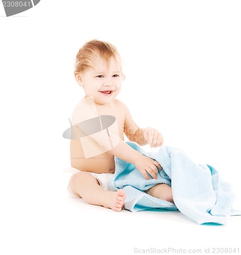 Image of baby with blue towel