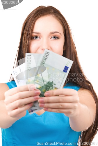 Image of lovely teenage girl with money