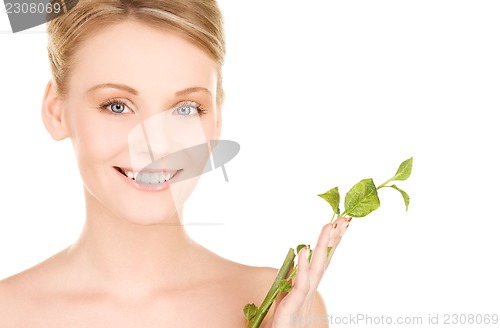 Image of woman with sprout
