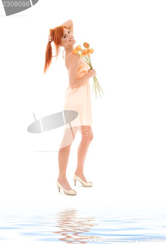 Image of redhead with flowers