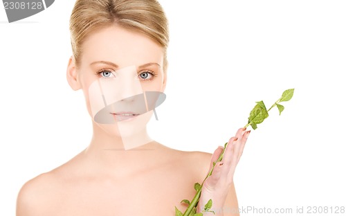 Image of woman with sprout
