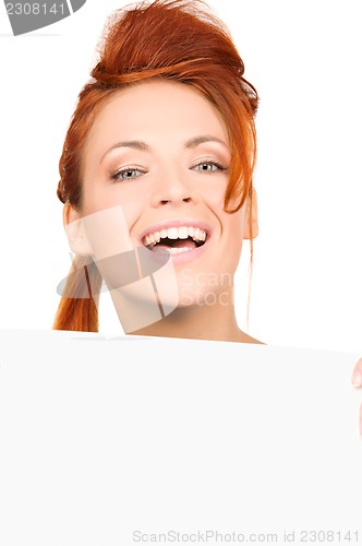 Image of happy woman with blank board