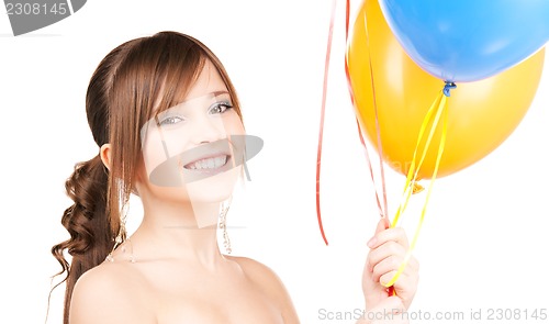 Image of happy teenage girl with balloons