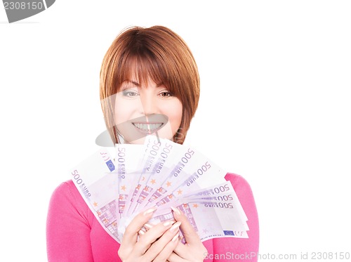 Image of happy woman with money