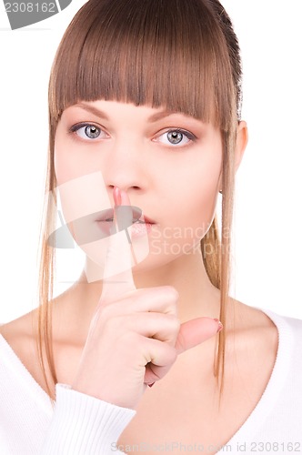Image of finger on lips