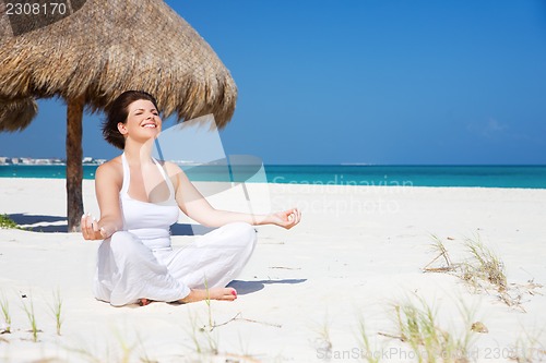 Image of meditation on the beach