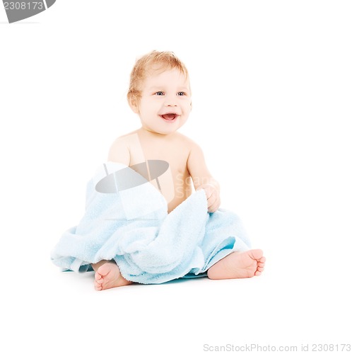 Image of baby with blue towel