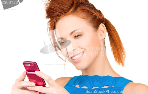 Image of happy woman with cell phone