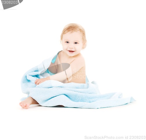 Image of baby with blue towel