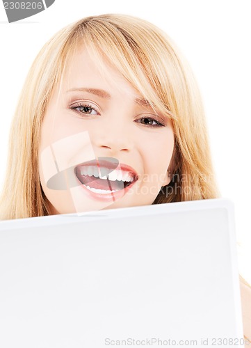 Image of teenage girl with laptop computer